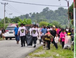 Peduli Lingkungan, Kapolsek Bonggo Ikut Jalan Santai dan Aksi Bersih Sampah Bersama Warga