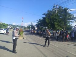 Sat Lantas Polres Sarmi Kawal Lomba Gerak Jalan Sambut HUT RI ke-81